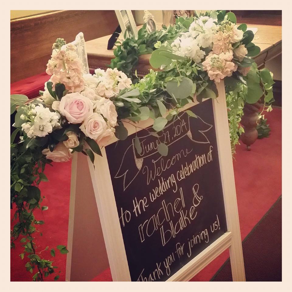 wedding sign flowers nwa